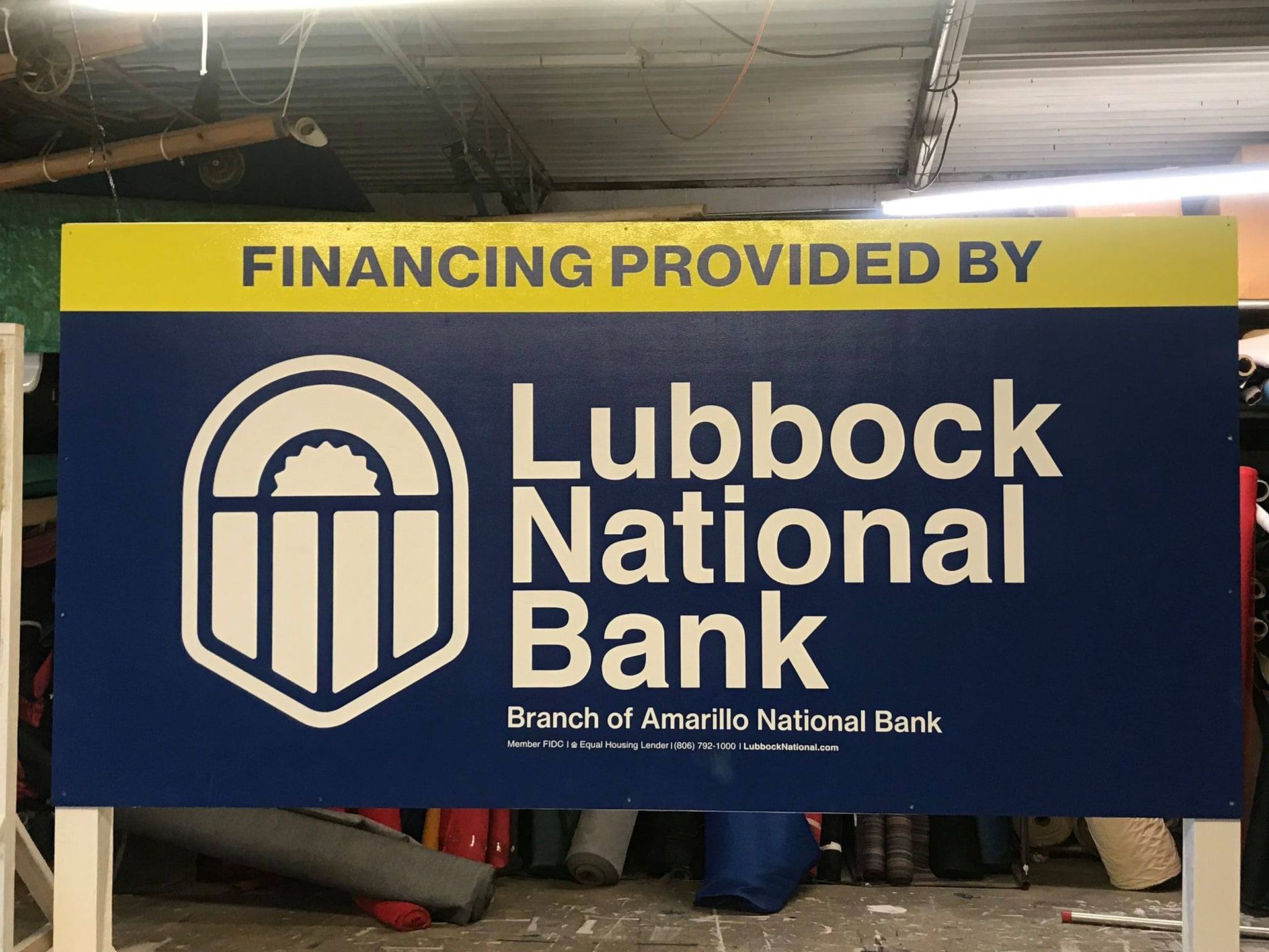 Sign for Lubbock National Bank with logo and 