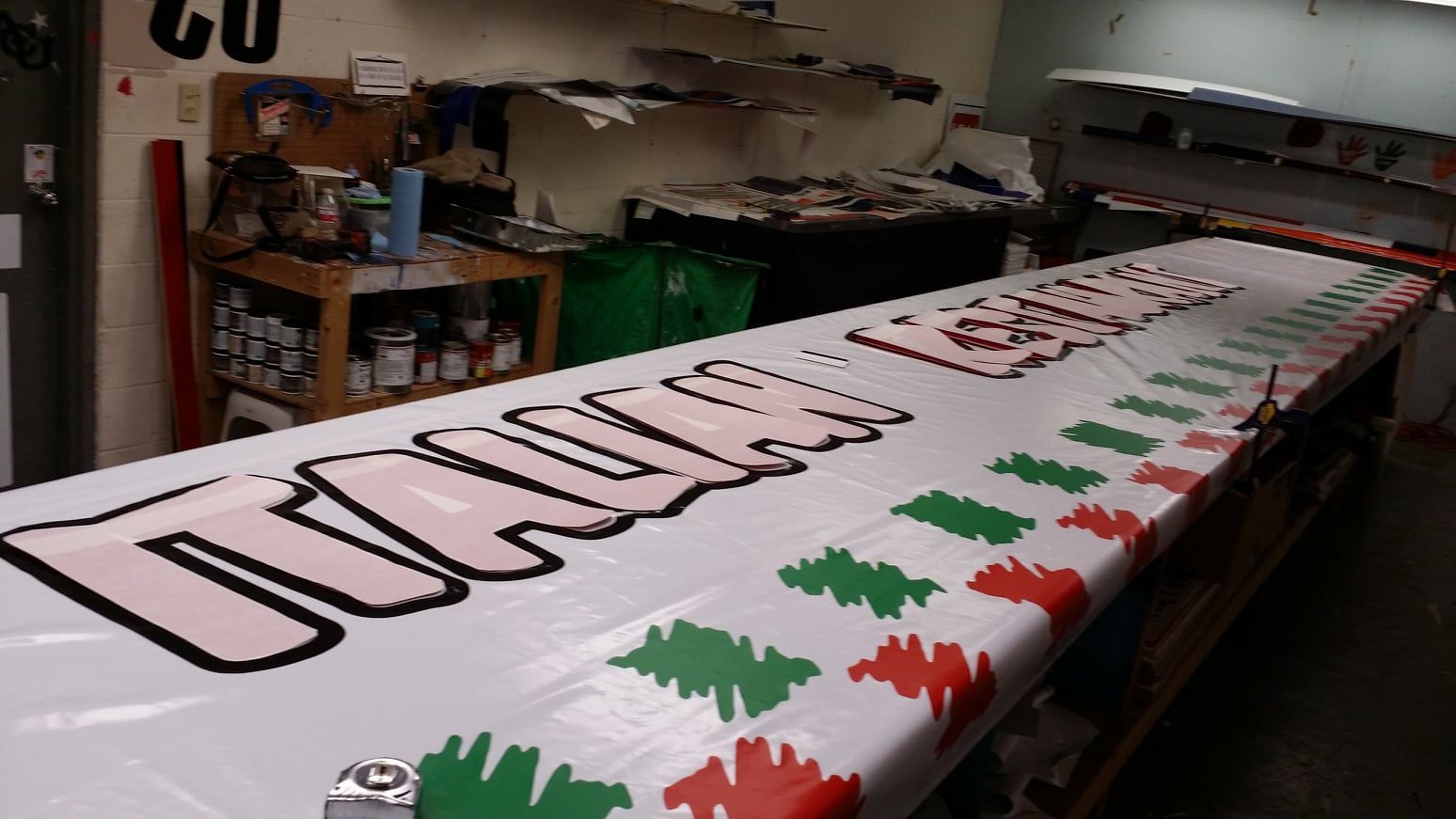 Large white banner with the word 