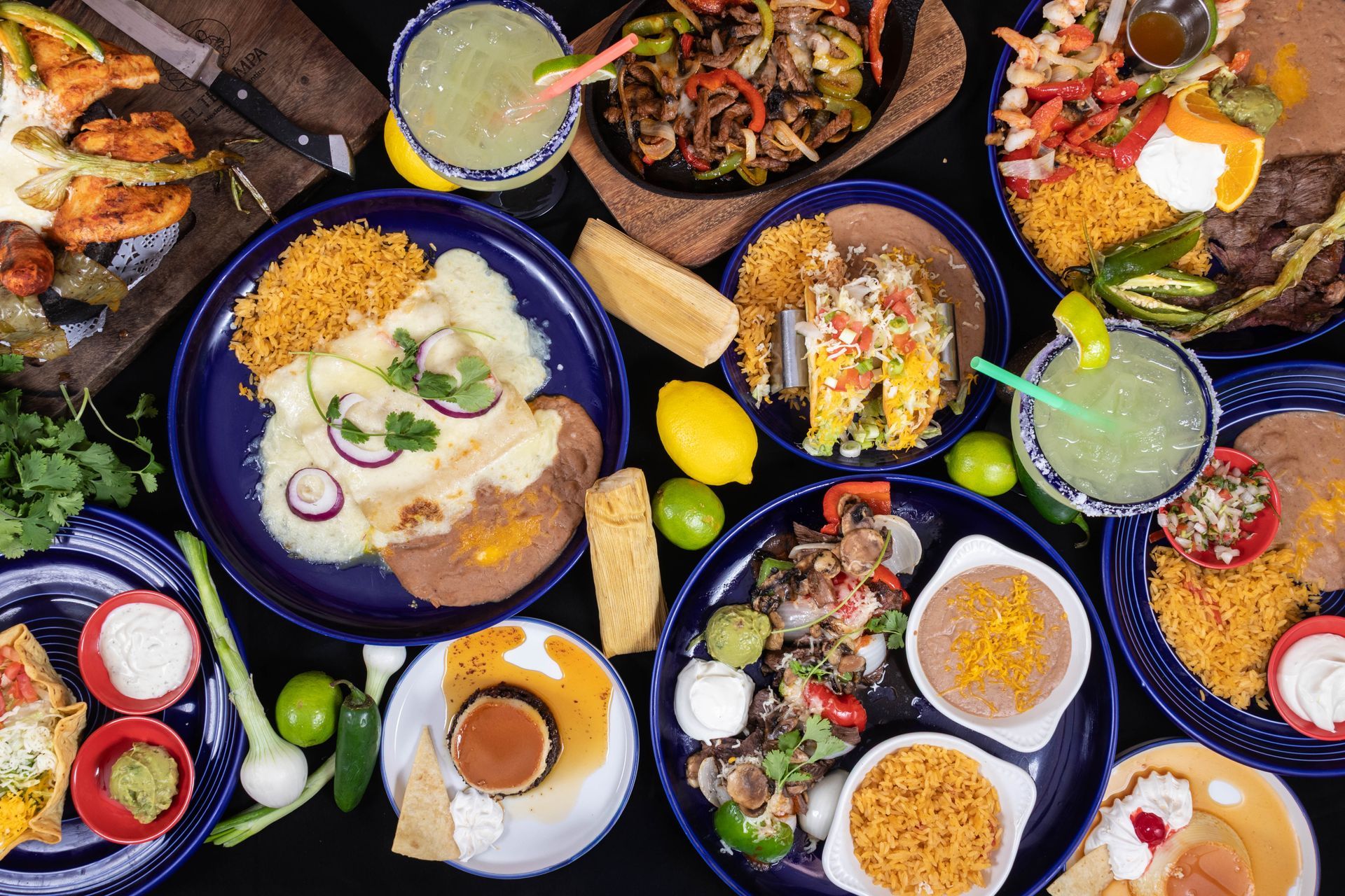 Mexican platter with shrimp, chorizo, peppers, and grilled vegetables