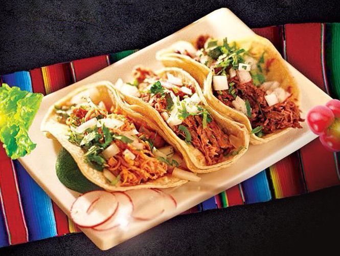 Three tacos on a rectangular plate