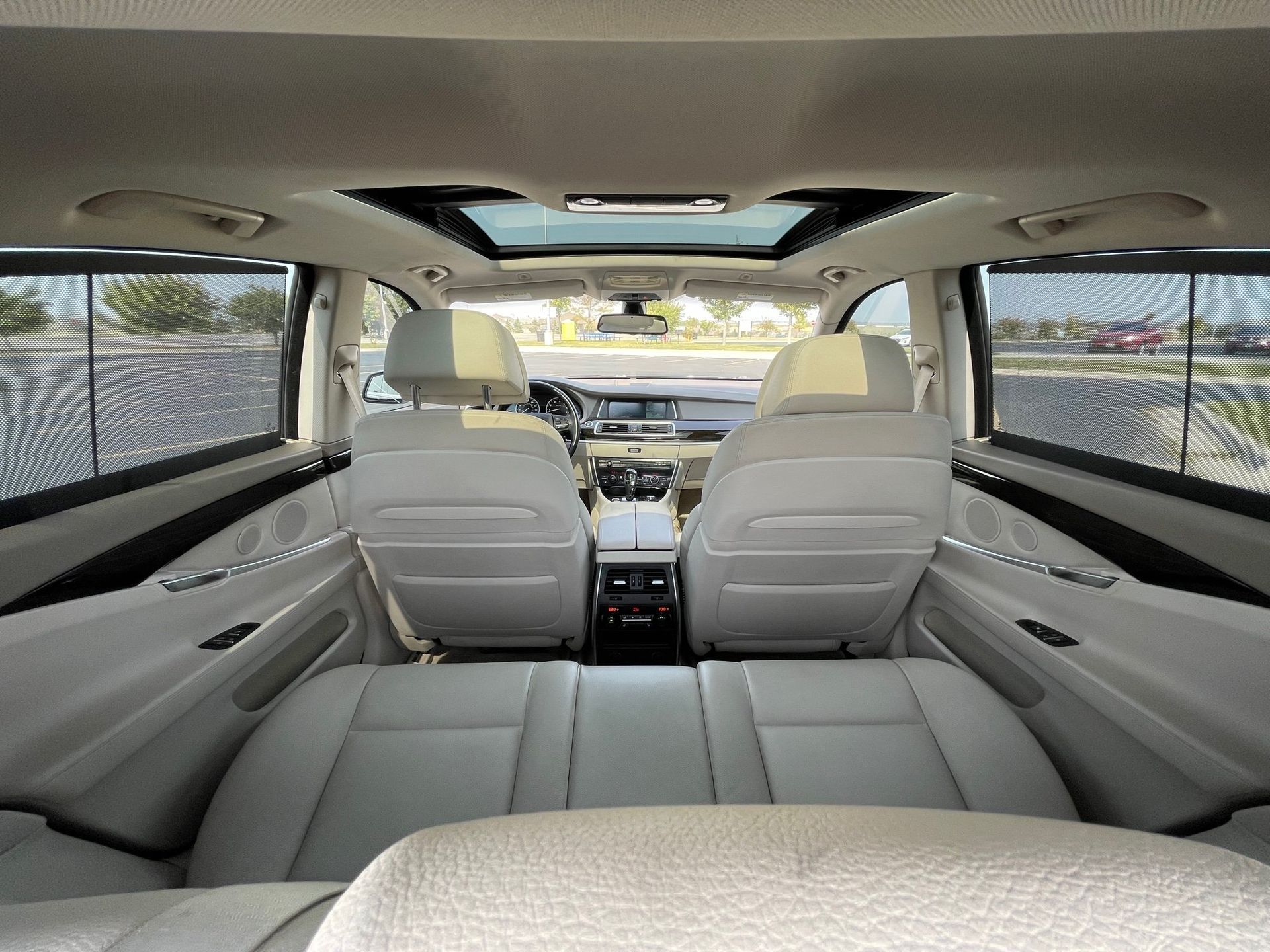the inside of a car with the sunroof open
