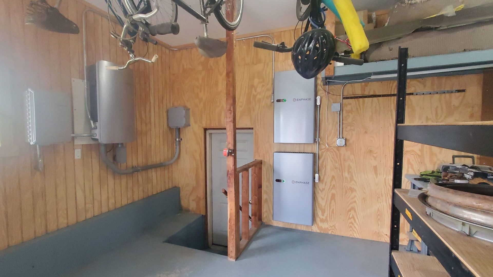 Residential solar battery storage system installed in a homeowner’s garage