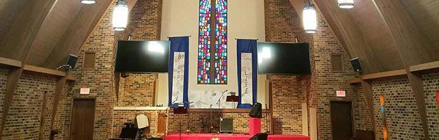 church with two television