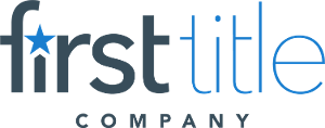 A blue and white logo for first title company