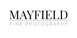 A black and white logo for mayfield fine photography