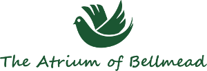 A logo for the atrium of bellmead with a green bird on a white background.