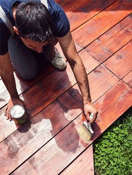 Man painting deck