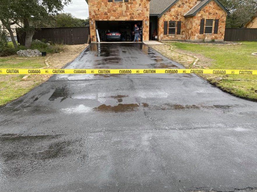 Sealcoating and dust control services