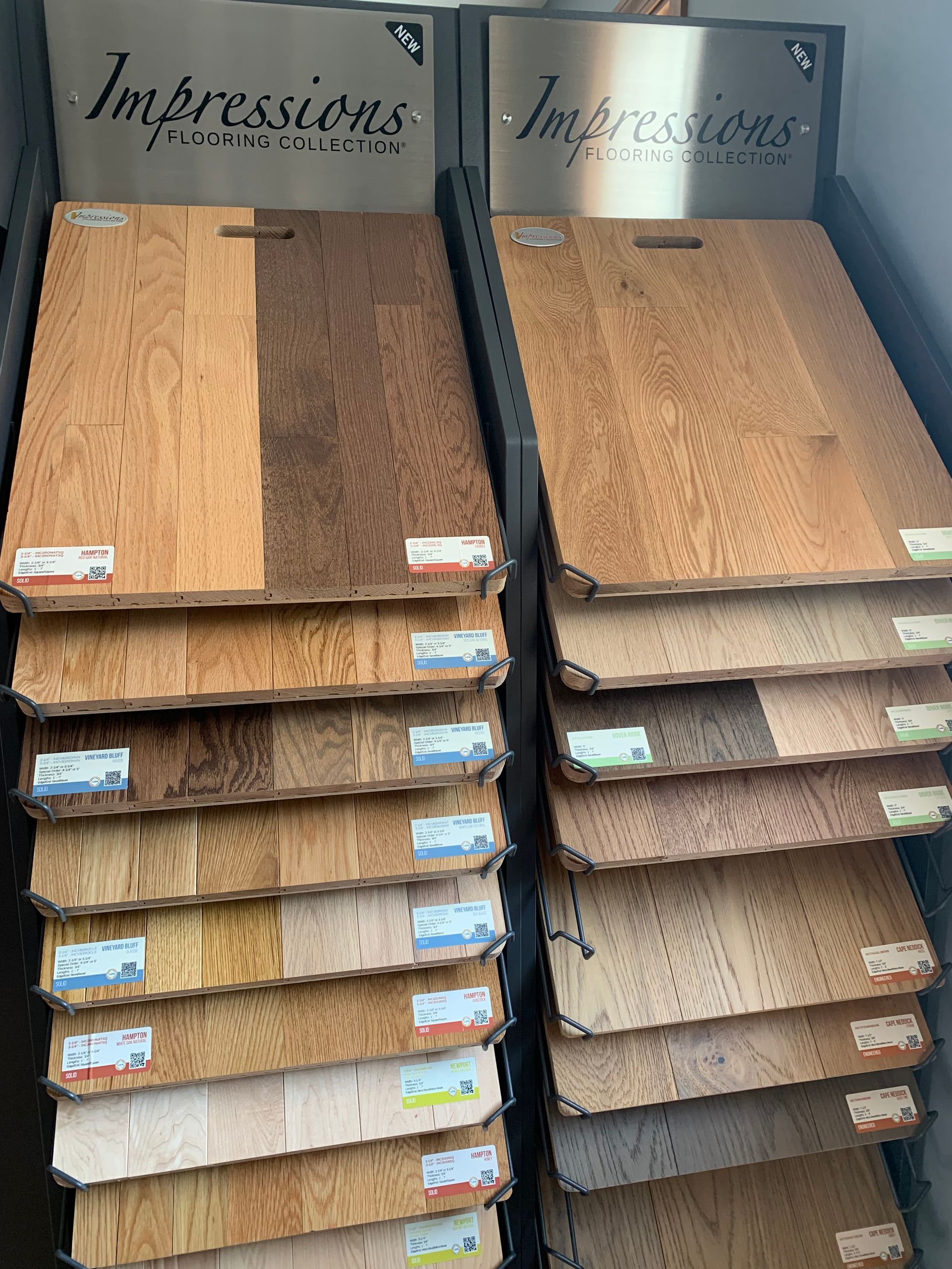 A display of different types of wood flooring in a store