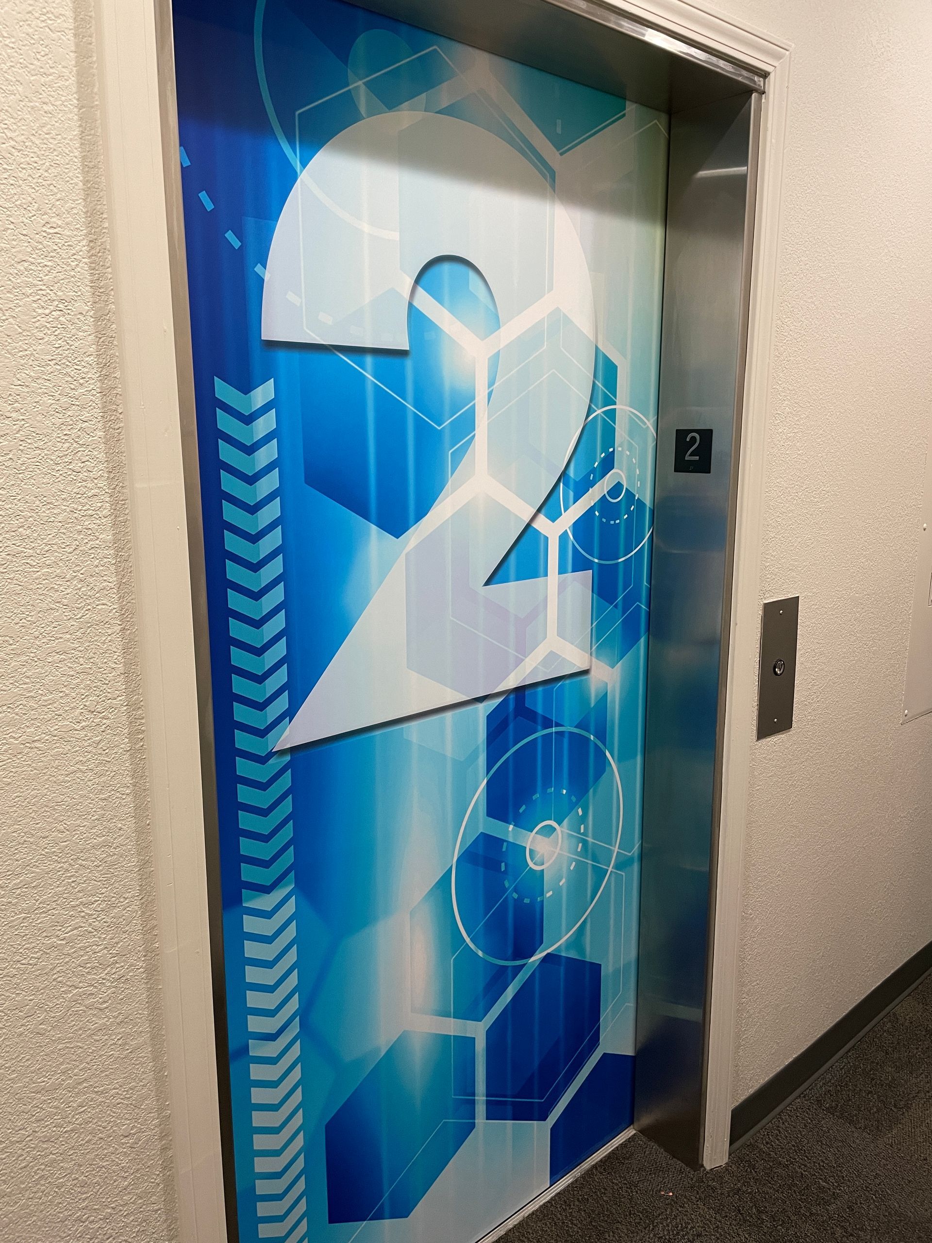 Elevator door with large 