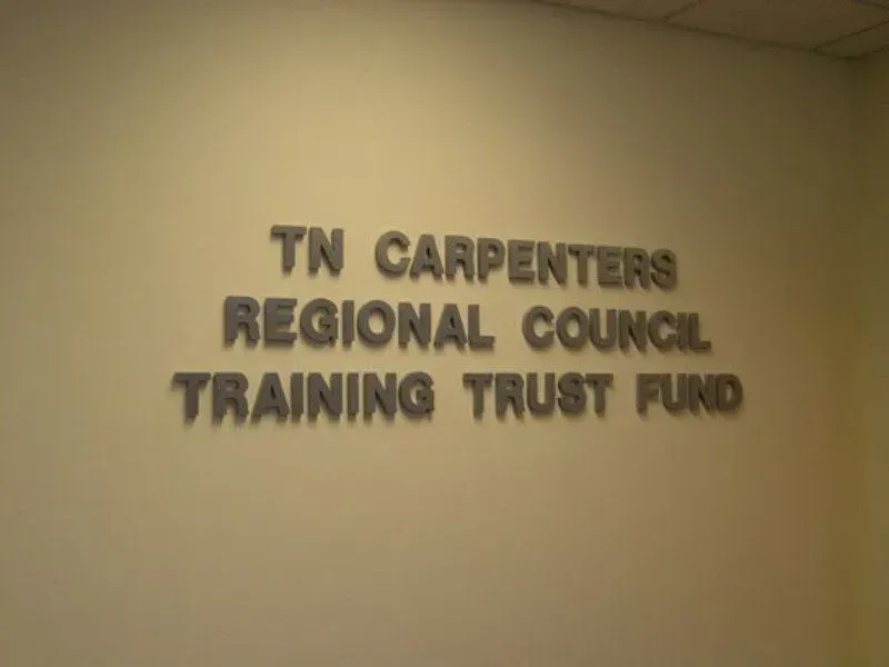 Text on a wall: TN Carpenters Regional Council Training Trust Fund.