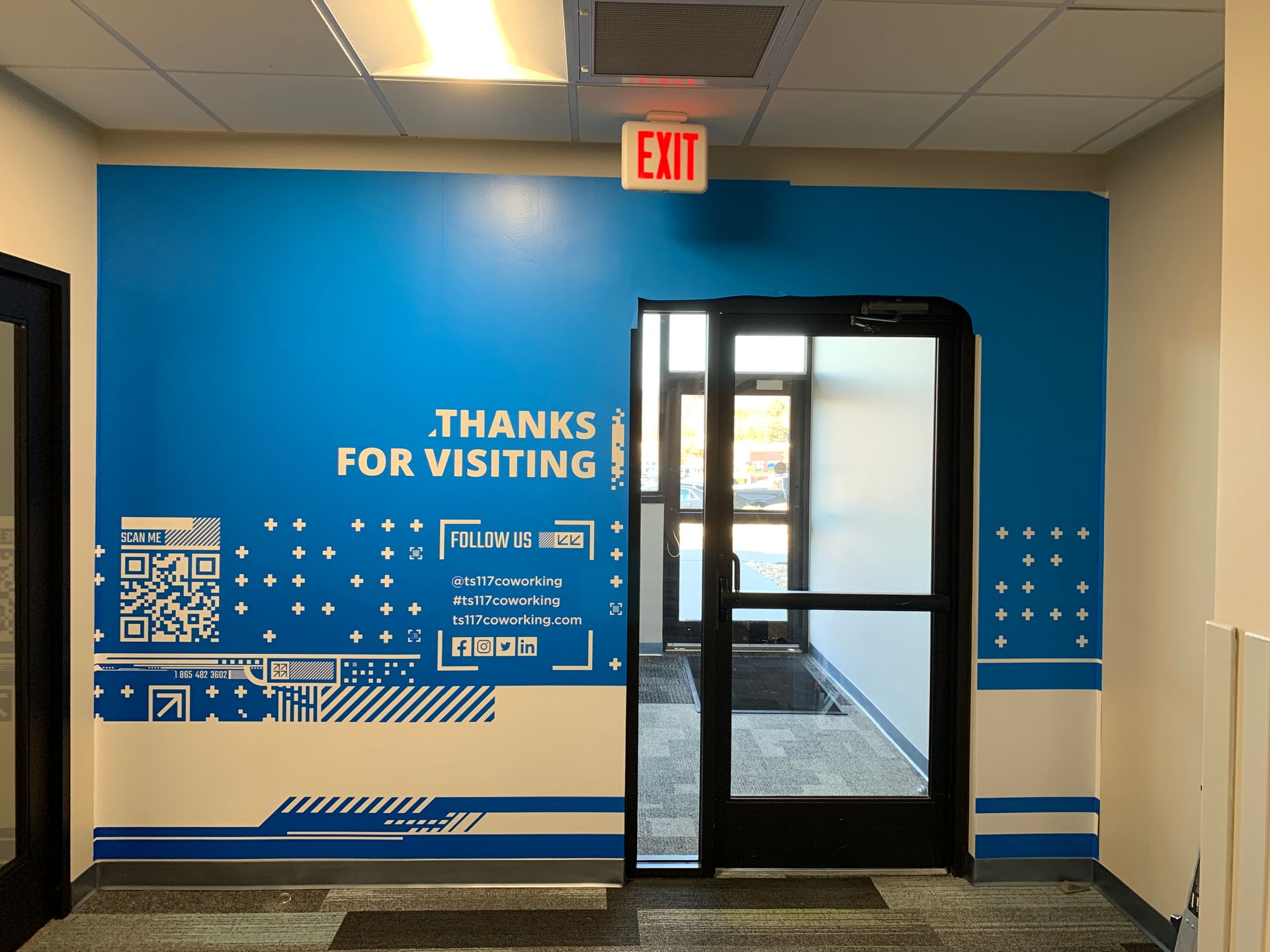 Blue wall with white text, 