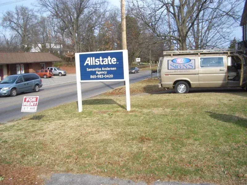 Allstate sign, tan van with 