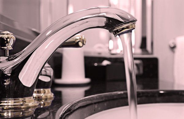 Running water on faucet