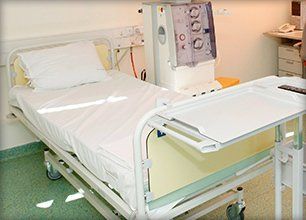 Hospital bed with table