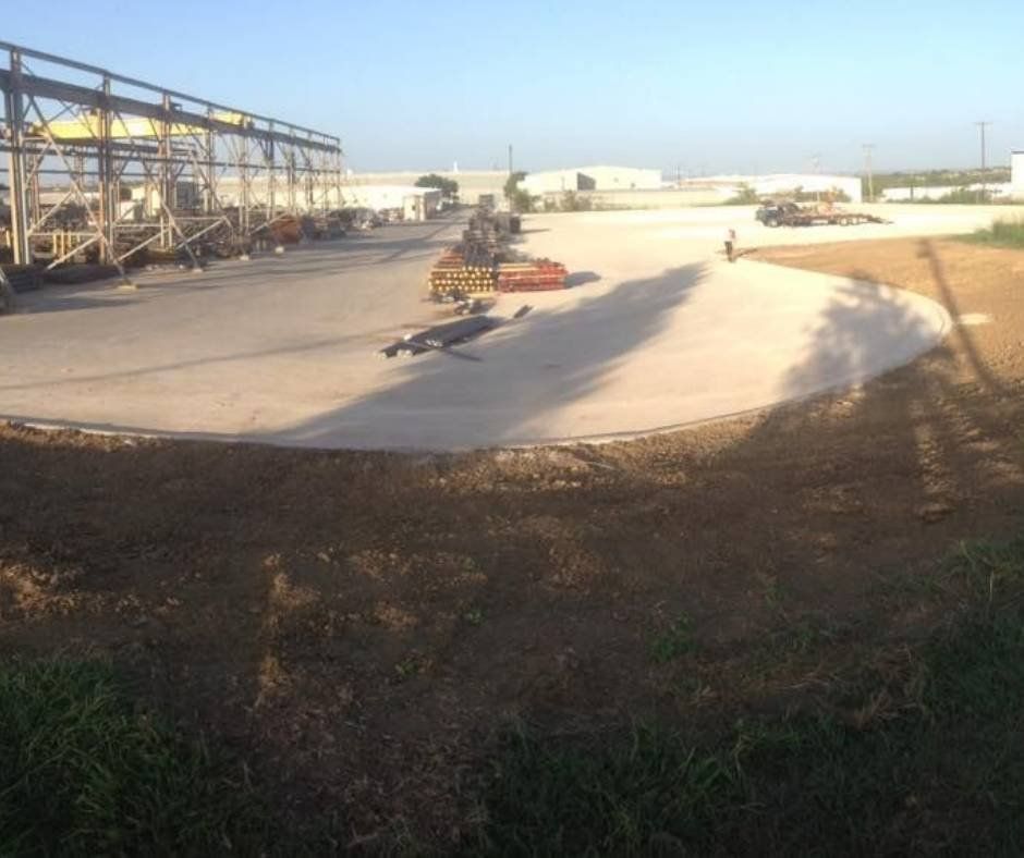 A parking lot with a lot of trucks parked in it