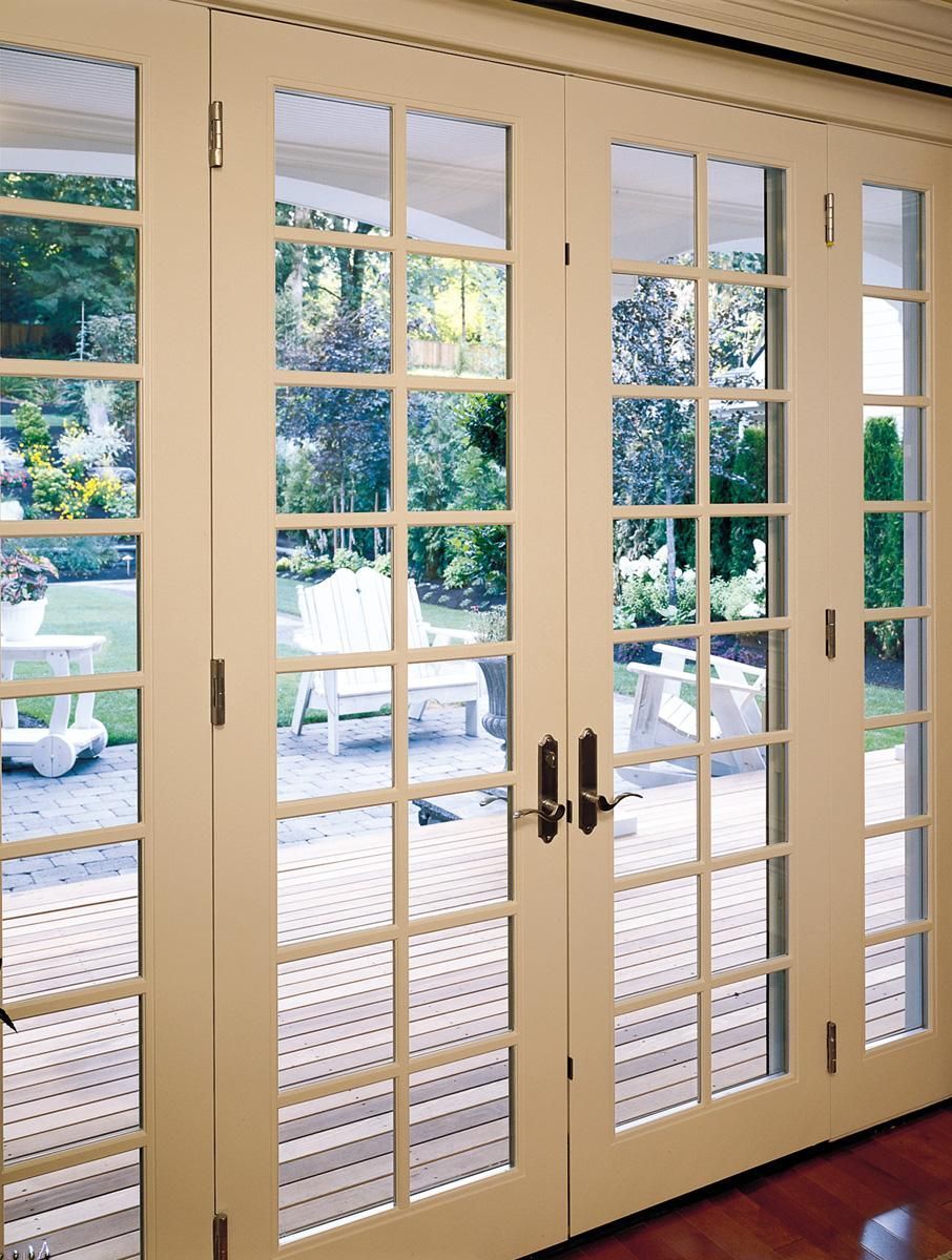 White French doors with glass panes and outdoor patio view through them