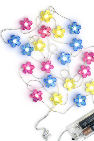 A string of lights with colorful flowers on a white background