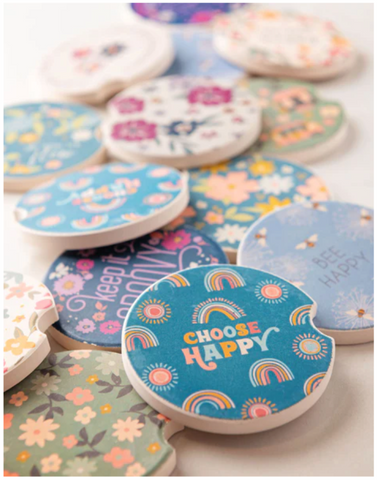 A bunch of coasters are sitting on top of each other on a table.