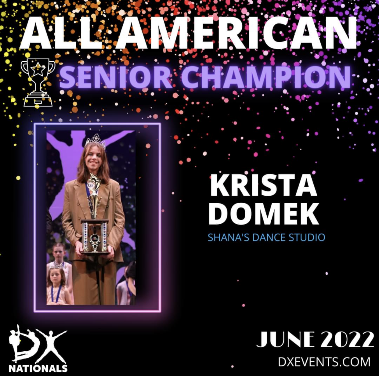 A picture of a woman holding a trophy on a stage