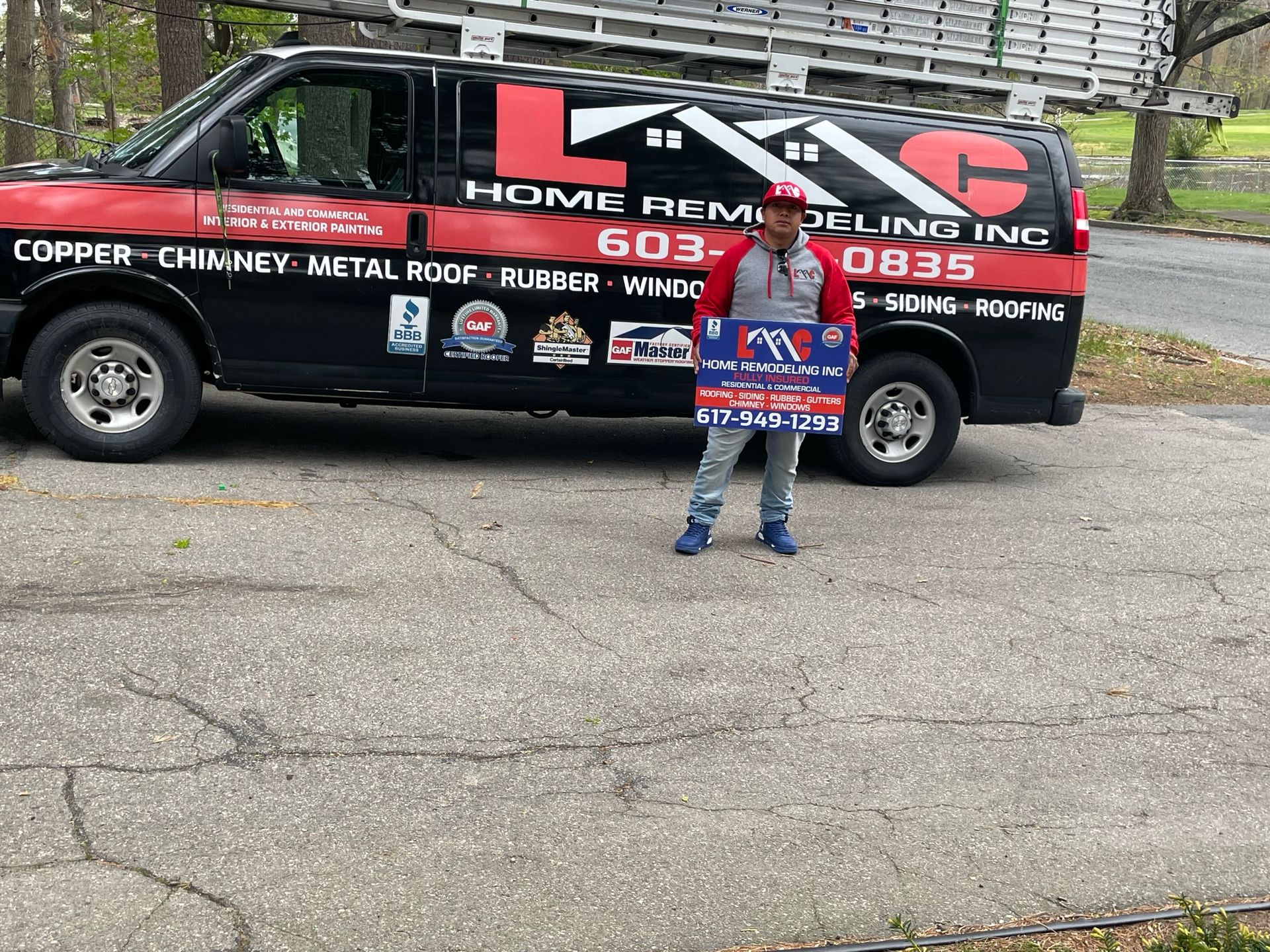 LMC Home Remodeling staff in front of service truck