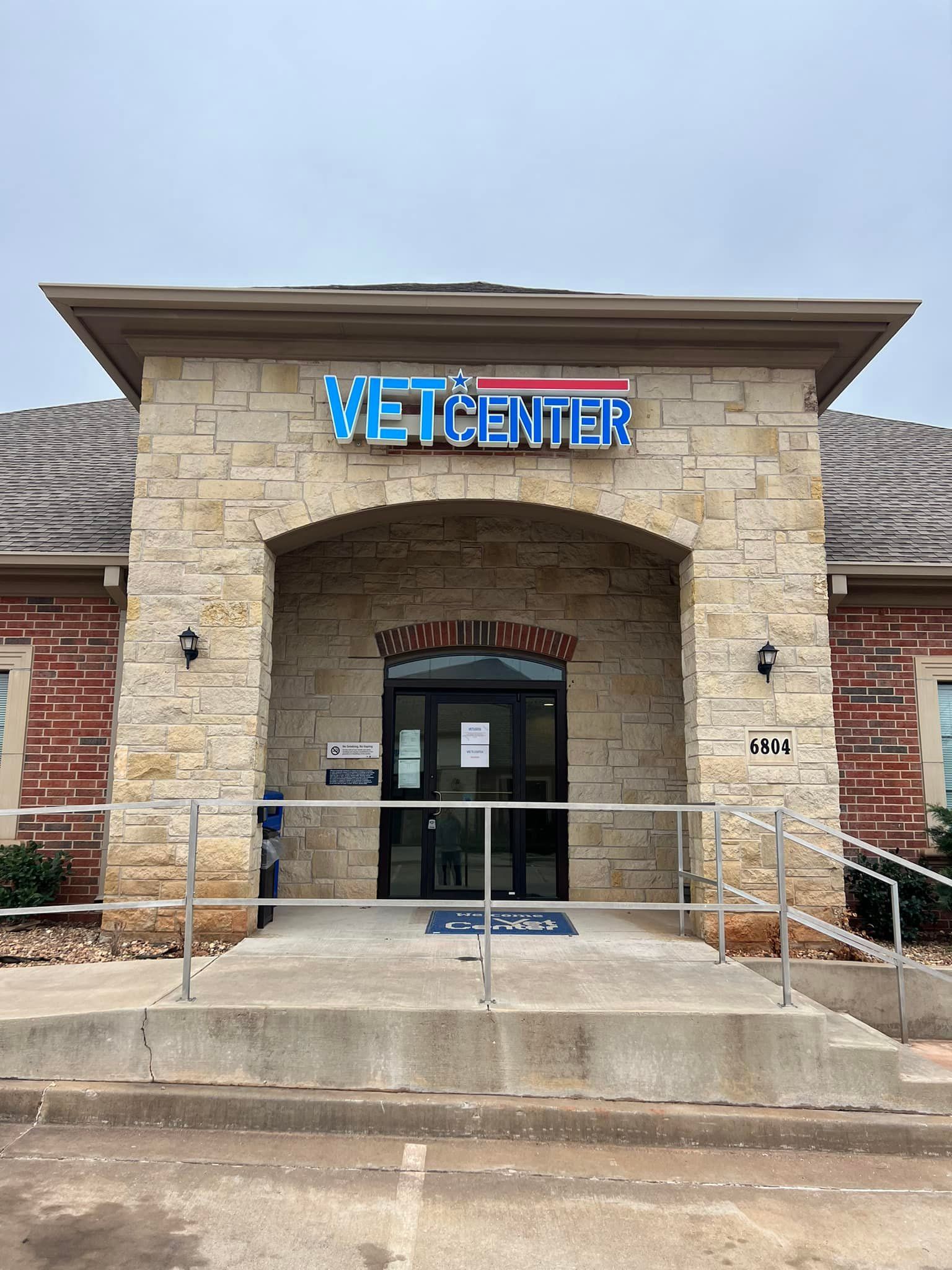 A brick building with a sign that says vet center