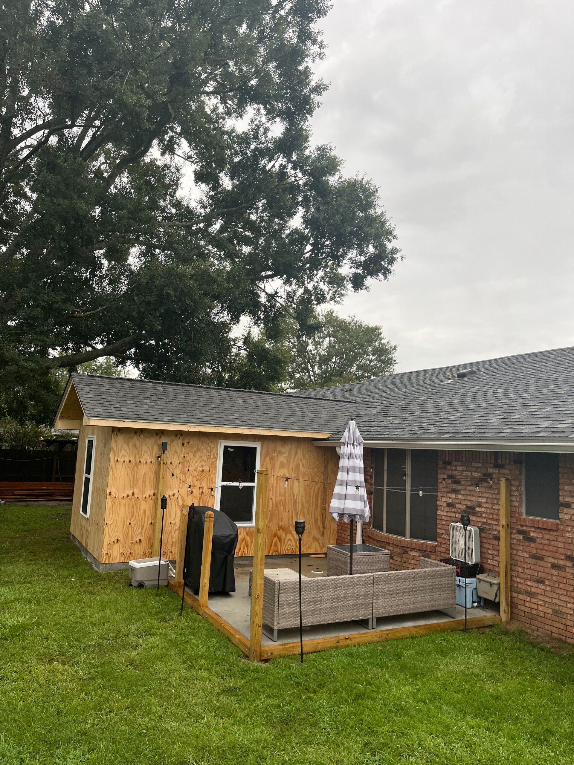 residential carpentry showing a new wooden addition on house
