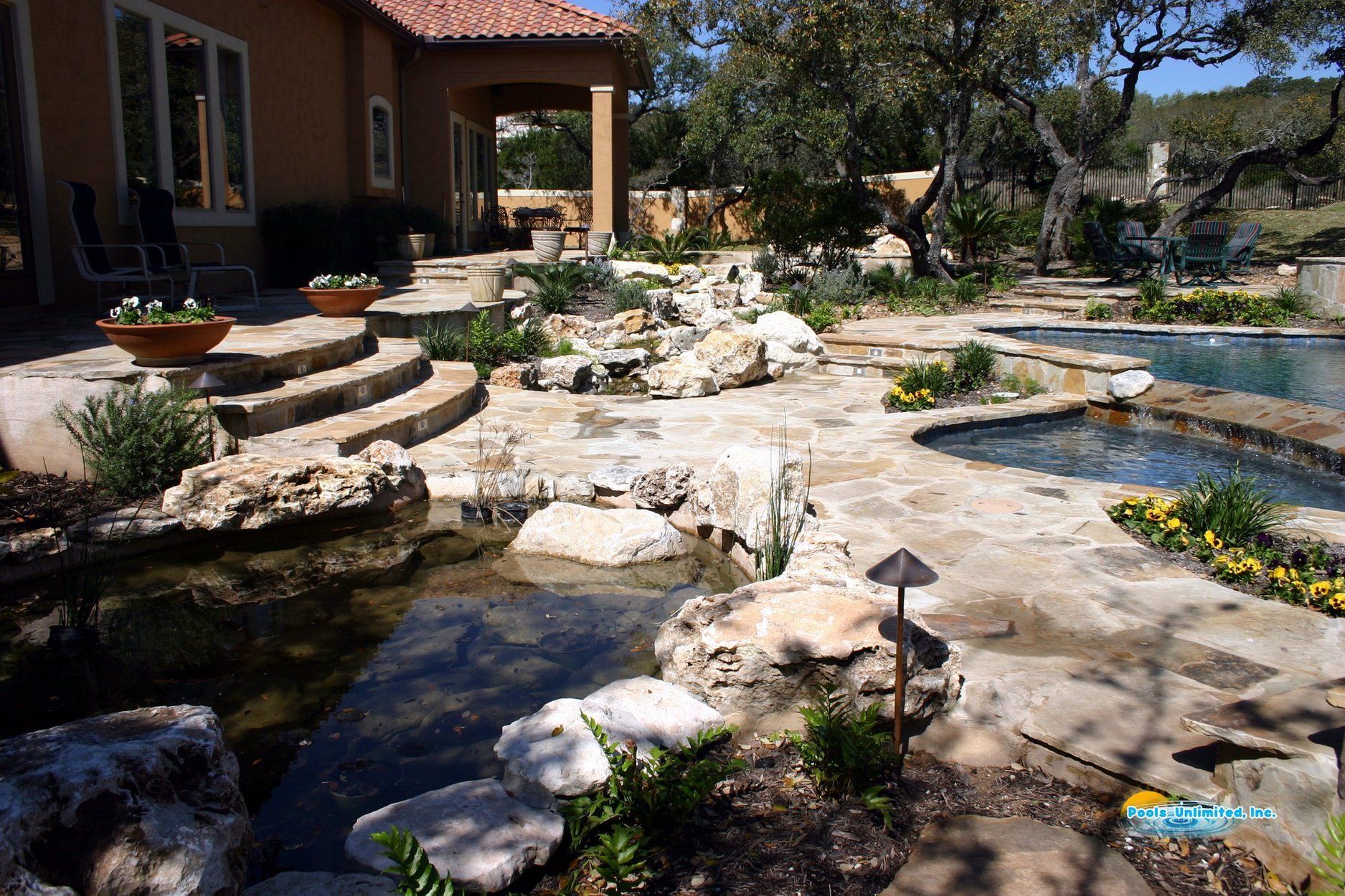 A large house with a swimming pool in the backyard