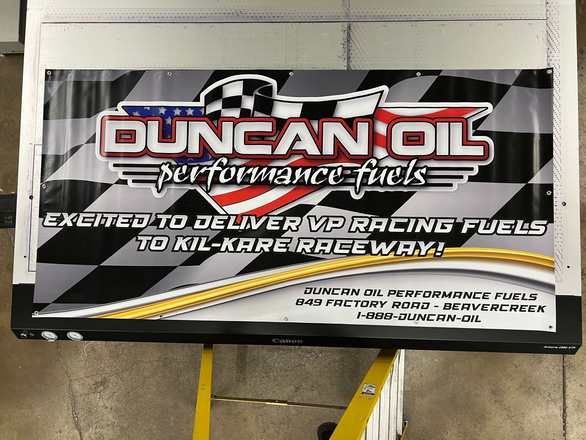 Sign for Duncan Oil performance fuels, announcing delivery to Kil-Kare Raceway, with logo and tagline.