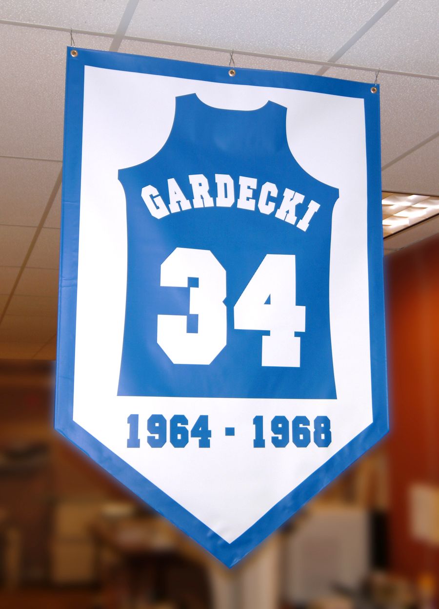 Banner with a blue jersey shape and the name Gardecki, number 34, and years 1964-1968.