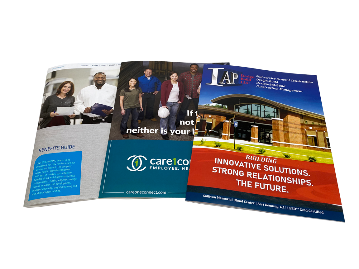 Three colorful brochures featuring people and buildings.