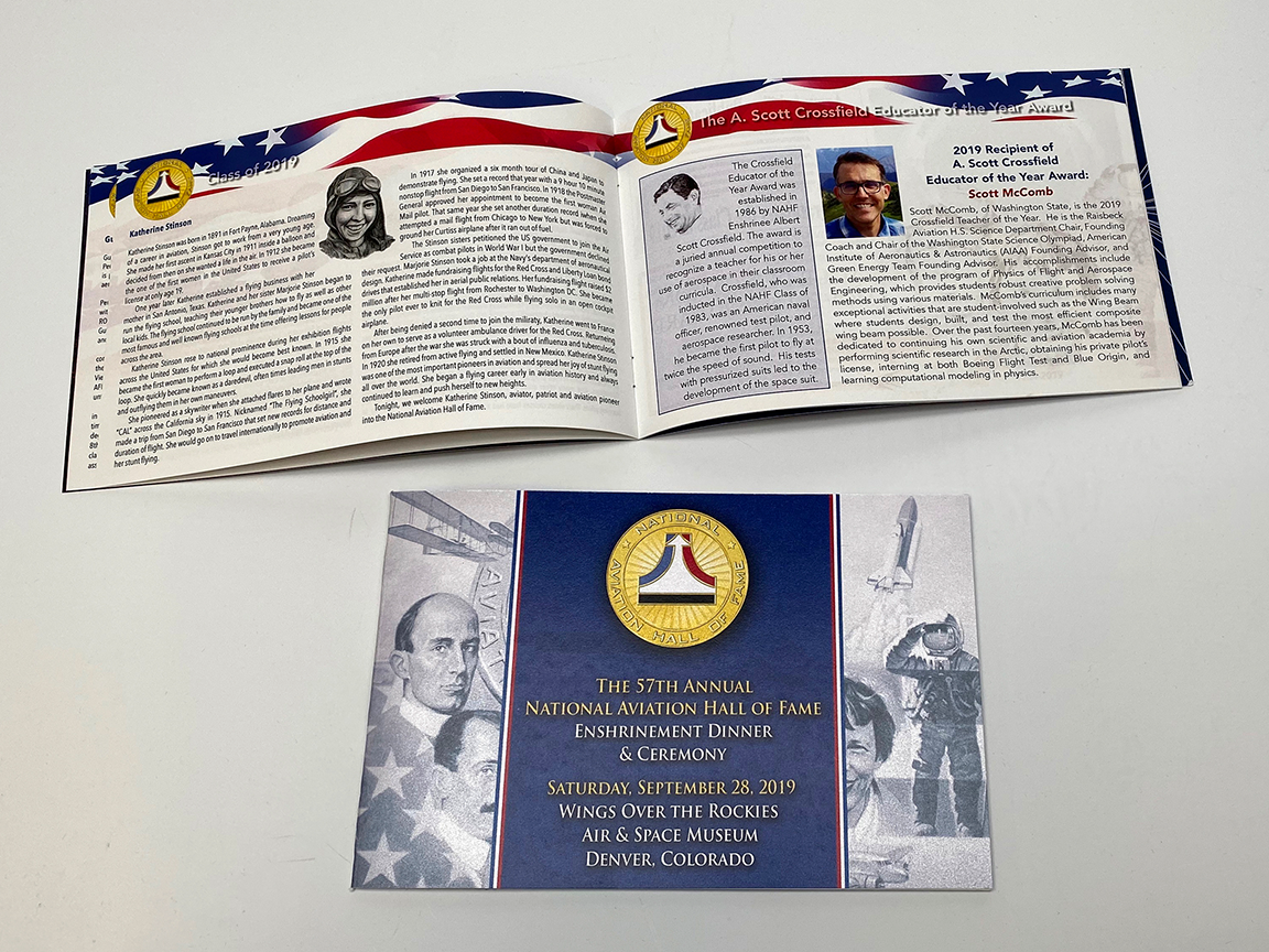 Open book, likely a civil defense pamphlet, with photos and text. Cover: blue with seal, patriotic imagery.