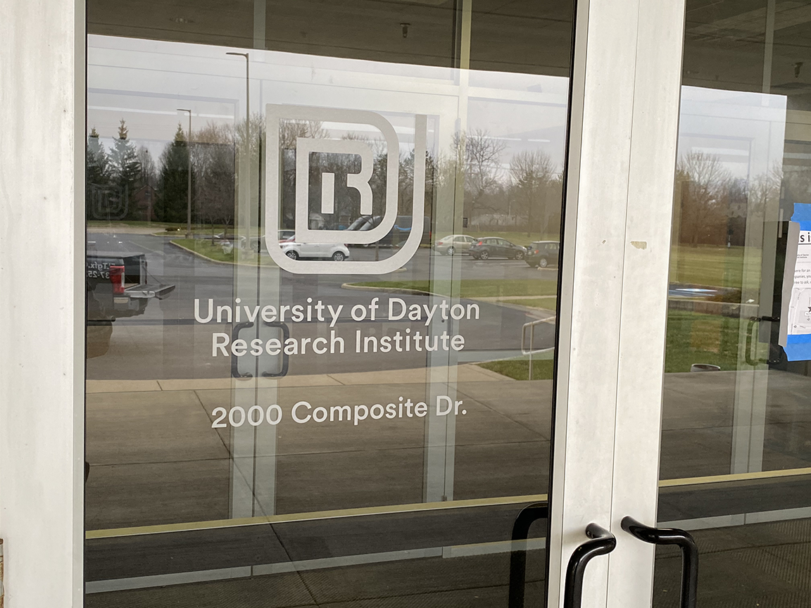 Glass doors with the University of Dayton Research Institute logo and address: 2000 Composite Dr.