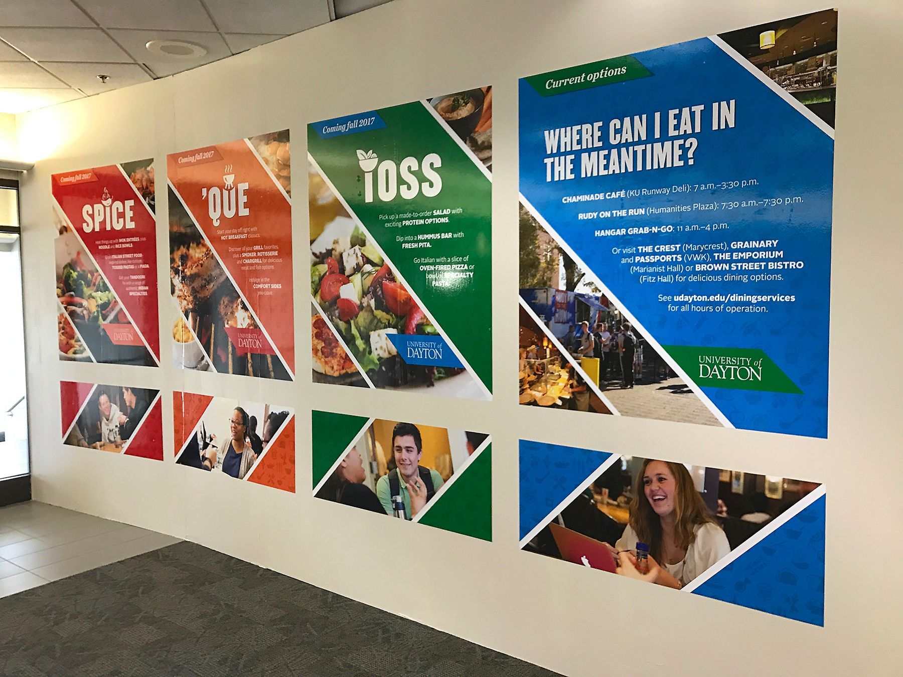 Posters on a white wall with food and restaurant options. Bright colors, people eating.