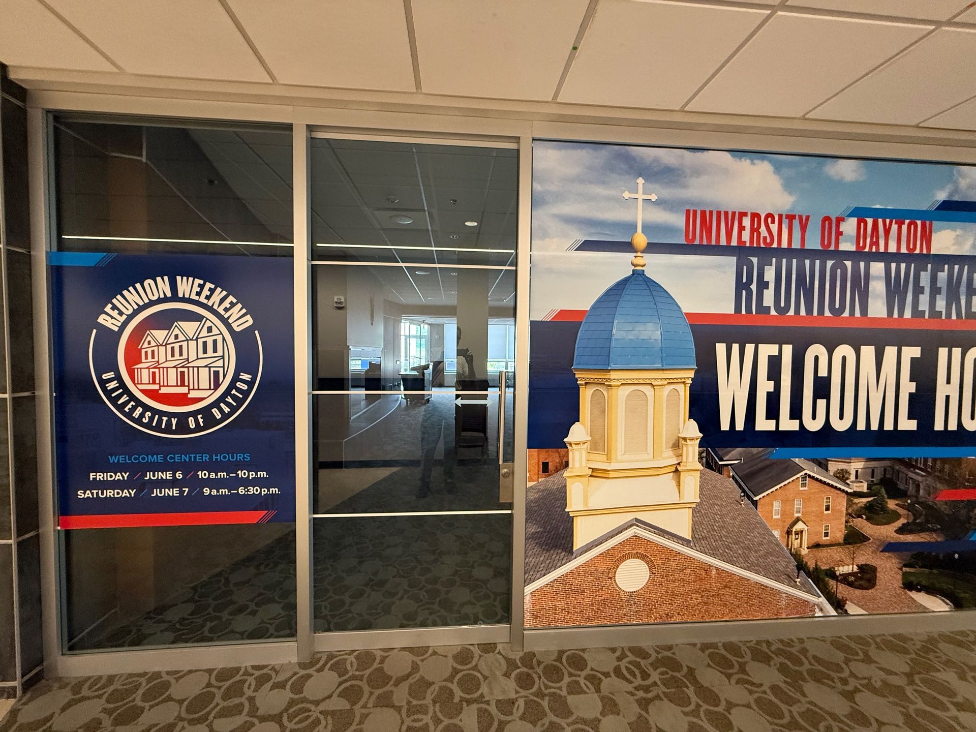 Doorway with Reunion Weekend banners; University of Dayton. Welcome home!