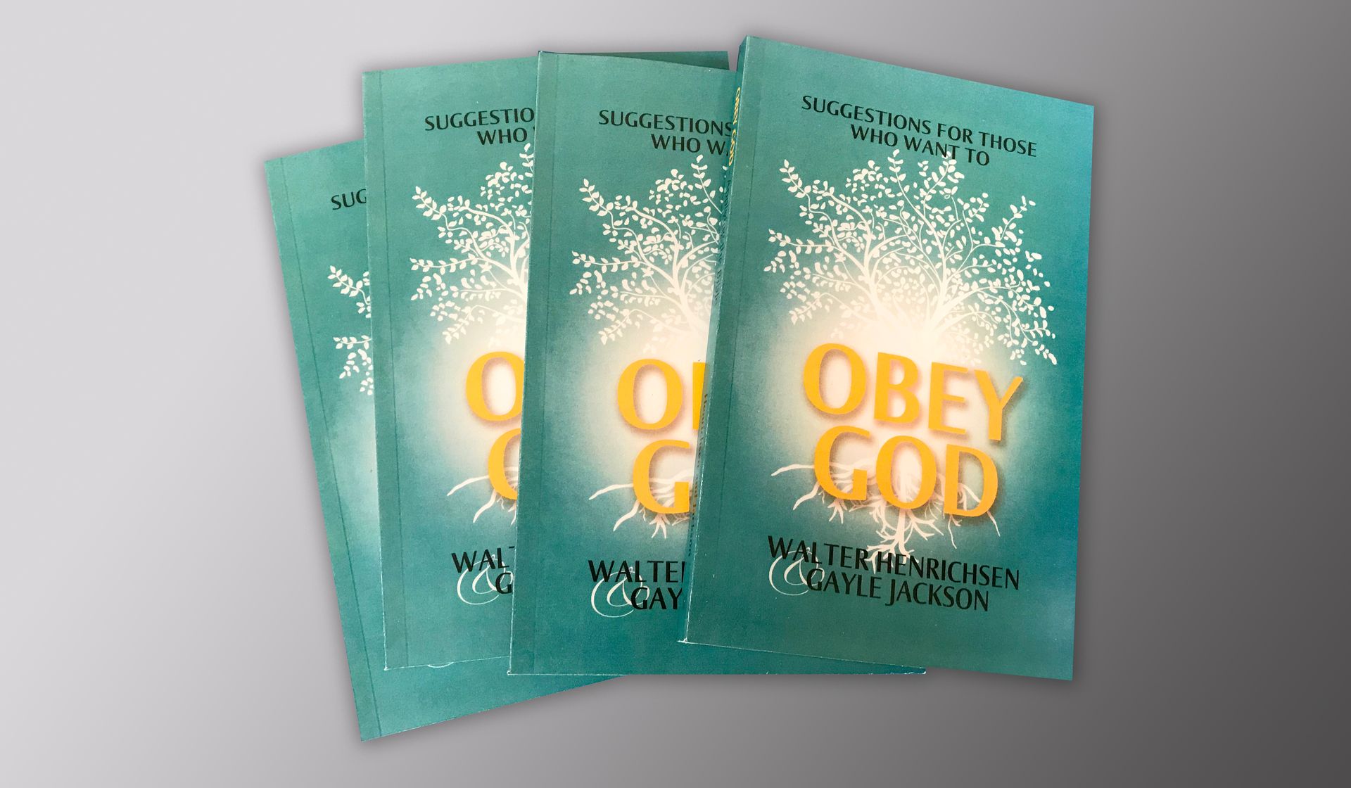 Four teal books with 