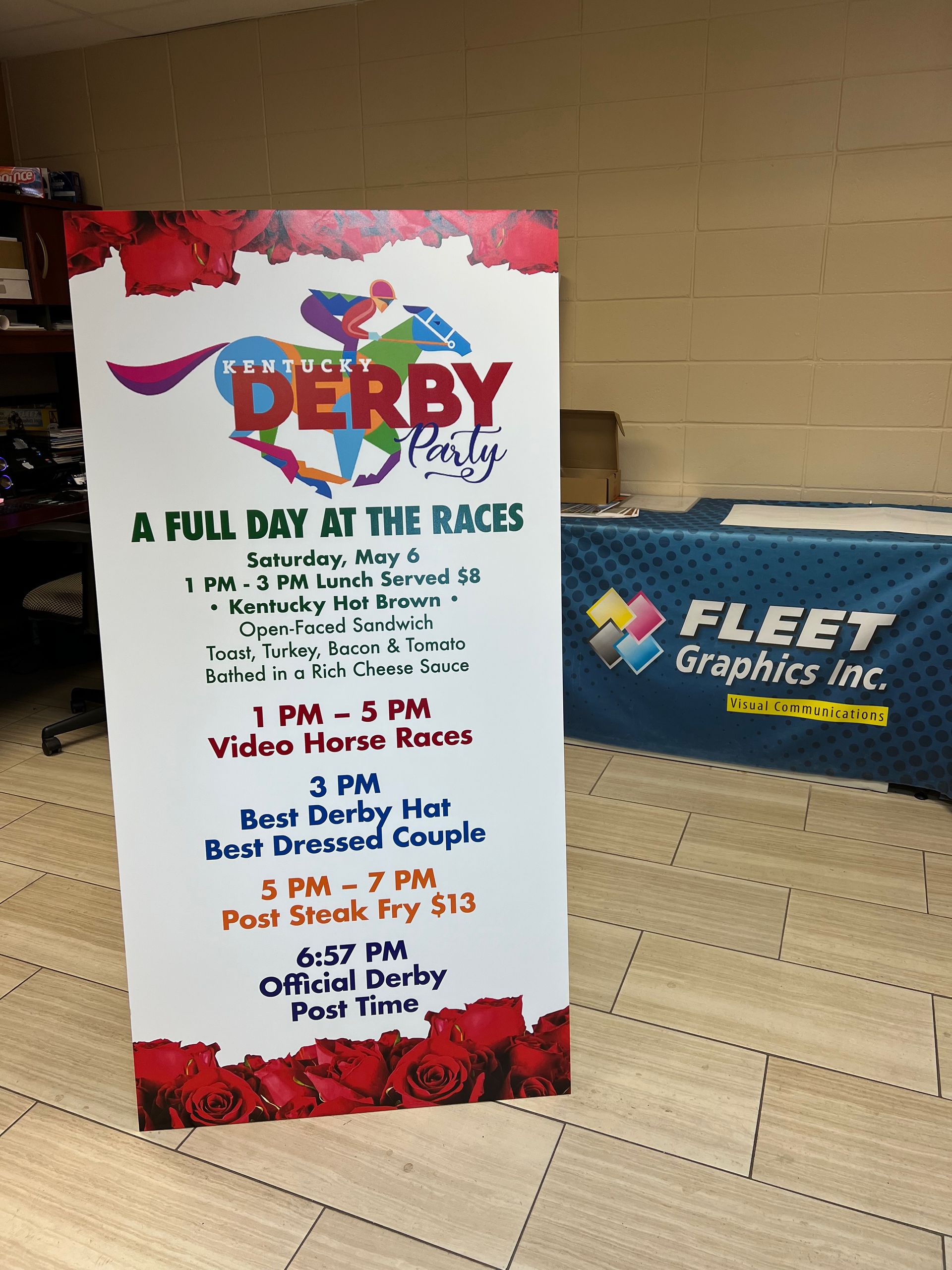 A sign for a Derby party listing a full day of events, including video horse races, best hat, and food.