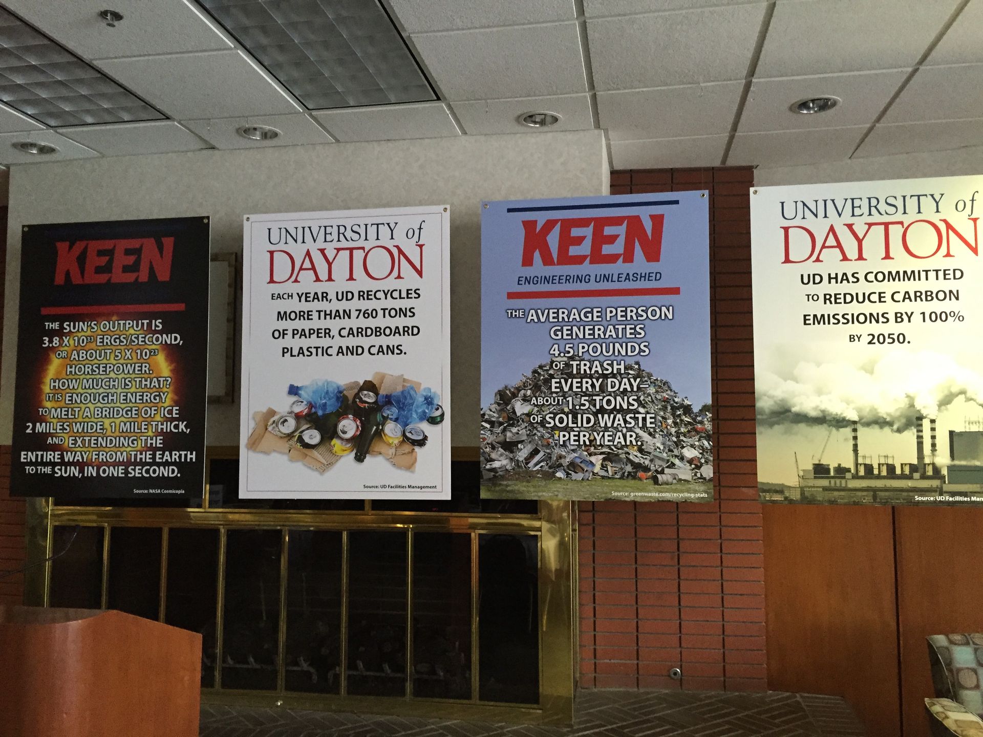 Four framed posters: two