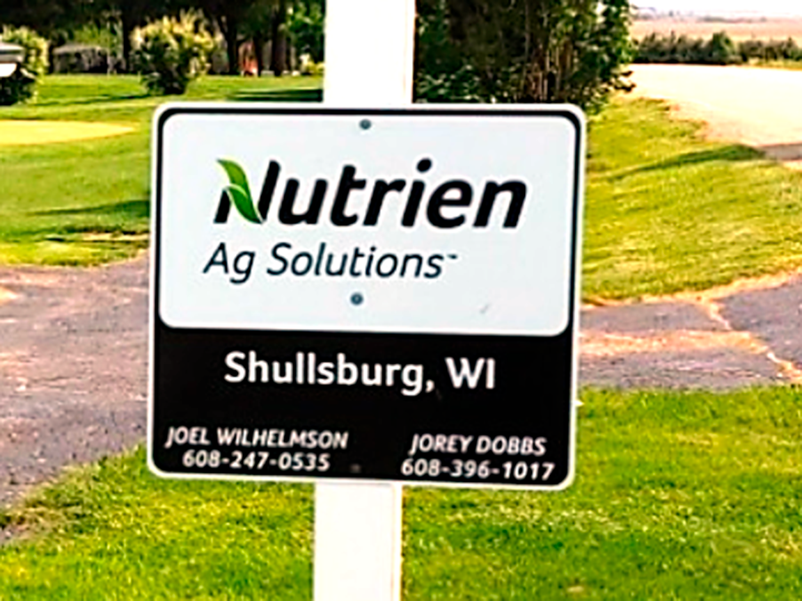 Sign for Nutrien Ag Solutions in Shullsburg, WI, with contact info.