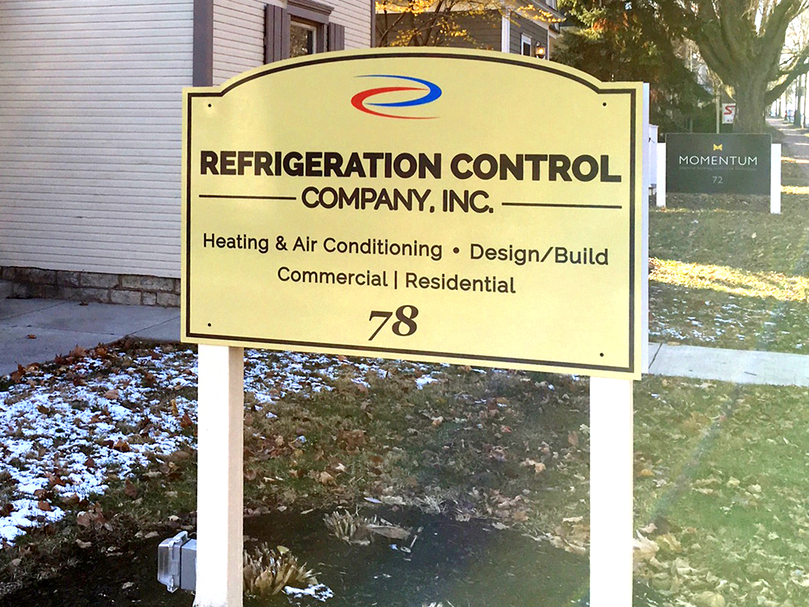 Sign for Refrigeration Control Company, Inc. with logo, services listed, and address 