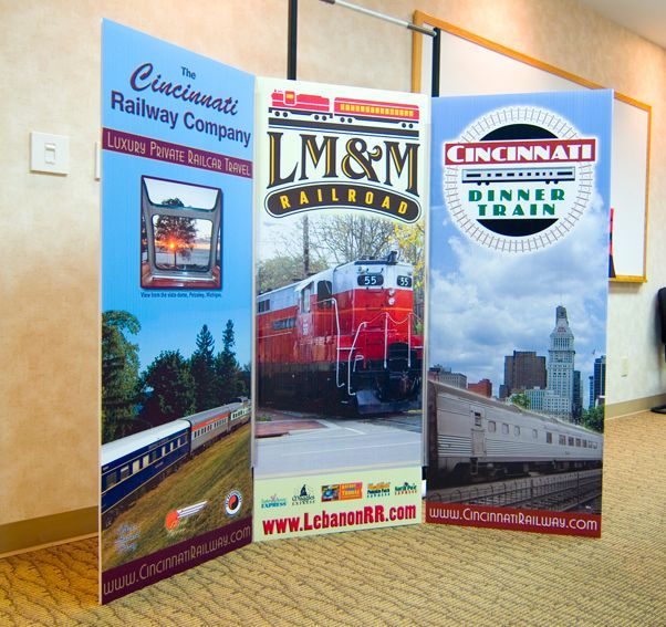 Tri-fold display for Cincinnati Railway Company, LM&M Railroad, and Cincinnati Dinner Train. Features train photos and logos.