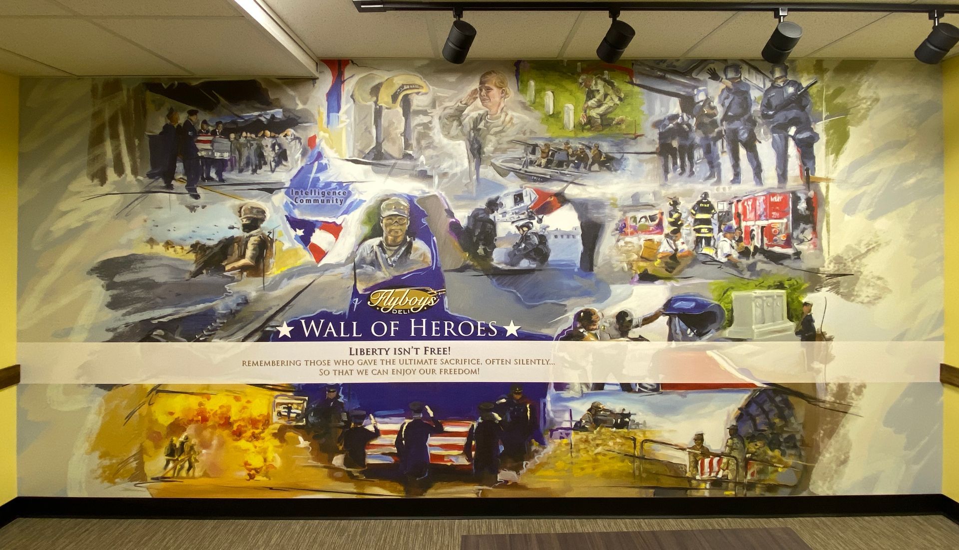 Mural, “Wall of Heroes”, depicting various service members and scenes, patriotic colors.