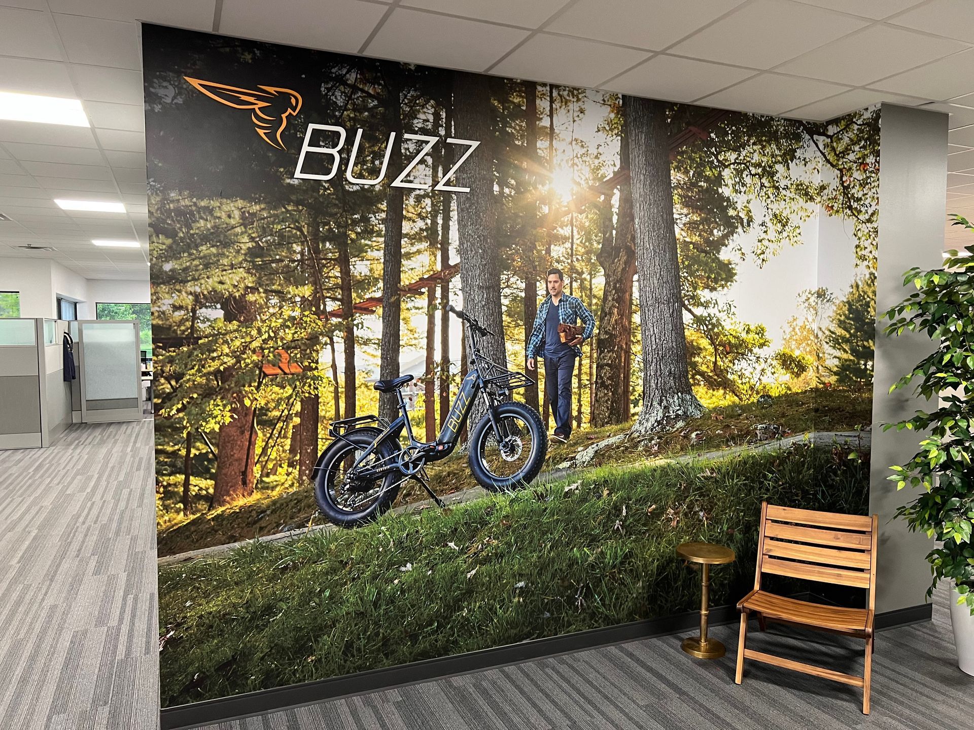 Mural: Man with bike in forest;