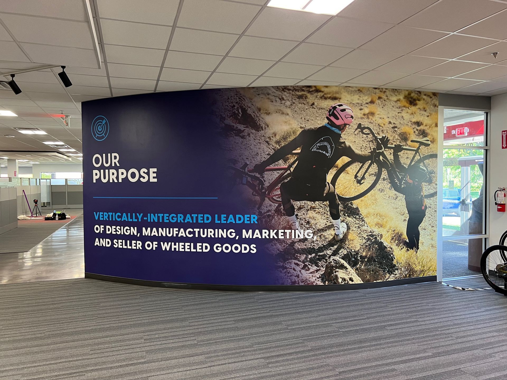 Mural with biker graphic. Text: