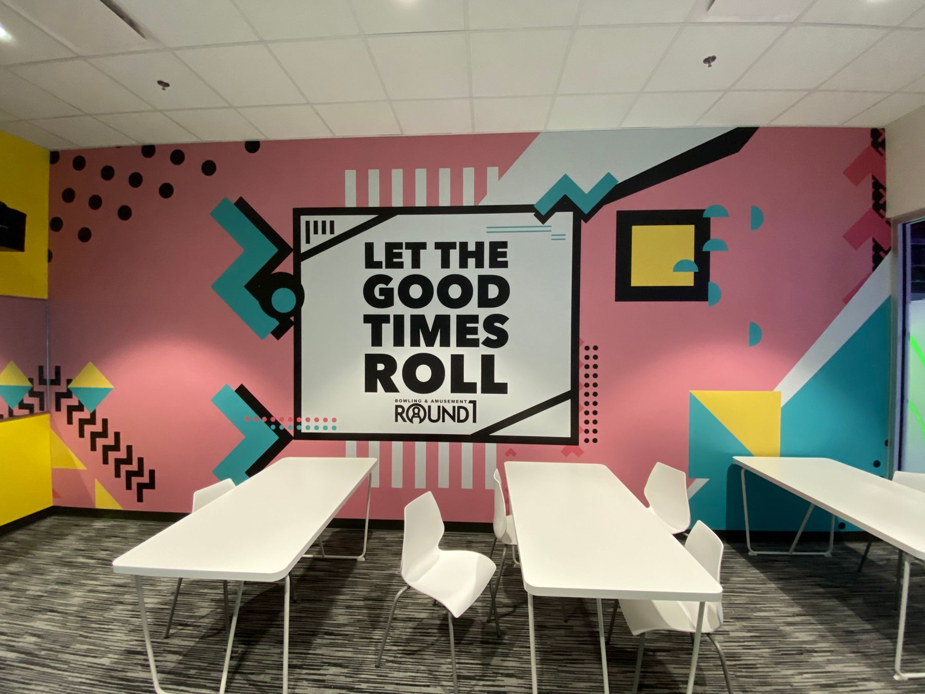 Room with a mural saying