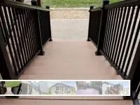 Stairway with dark brown railings leads to an outdoor space. Wooden deck is light brown.