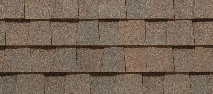 Brown and gray asphalt roof shingles.