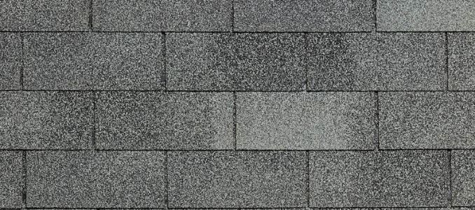 Gray asphalt roof shingles.