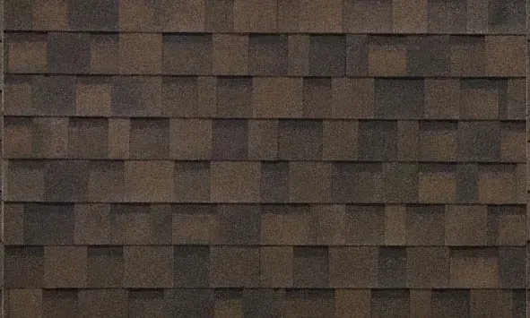 Brown and dark brown asphalt shingles, textured and overlapping.