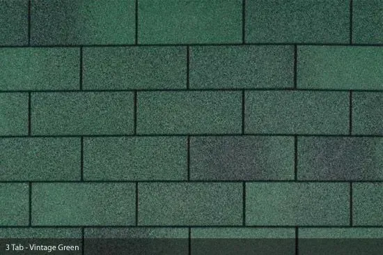 Green asphalt roofing shingles with a brick-like pattern, labeled 